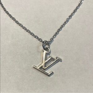 Authentic re Lux Louis Vuitton zipper charm with free stainless steel chain